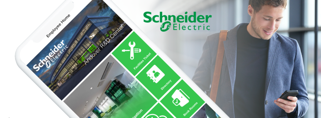 Schneider Electric Banner Image showing the Schneider Electric App Home Dash View. Green Schneider Logo is centered at top of image and younger, business casual-dressed male is looking at his phone on the right side of the image